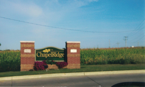 Photo of the sign of Chapel Ridge apartment complex.