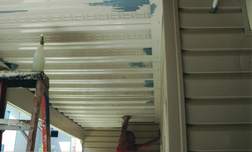 Another photo of preparing the metal ceiling in the hallway.