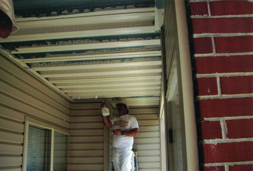 Photo of prepping the metal surface with vinegar solution.