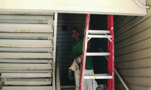 Photo of hard workin', but while keepin' a smile.