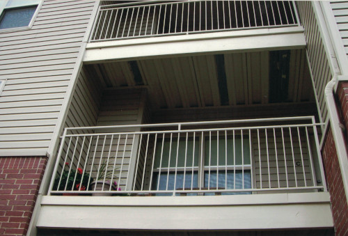 After photo of a stack of beautifully restored apartment decks.