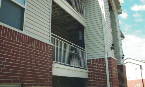 After photo of the outer metal siding of a deck from the side.