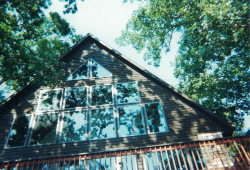 Another after photo of the home's restained front exterior.